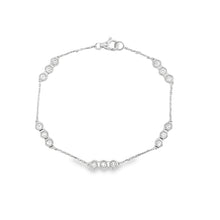 This beautiful 18k gold bracelet features round brilliant cut diamo...
