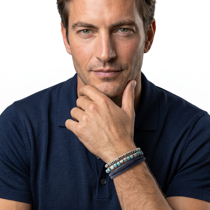 Tateossian men's bracelets stacked on model's wrist