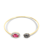 The ruby ​​and the diamonds look for each other along this 18kt gol...