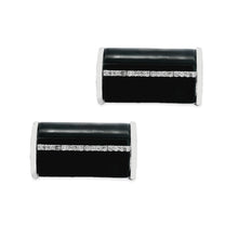 18k white gold diamond and onyx cuff links by Tateossian. 
The fron...