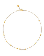 In this necklace, hand-engraved 18kt gold boules come together and ...