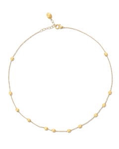 In this necklace, hand-engraved 18kt gold boules come together and ...