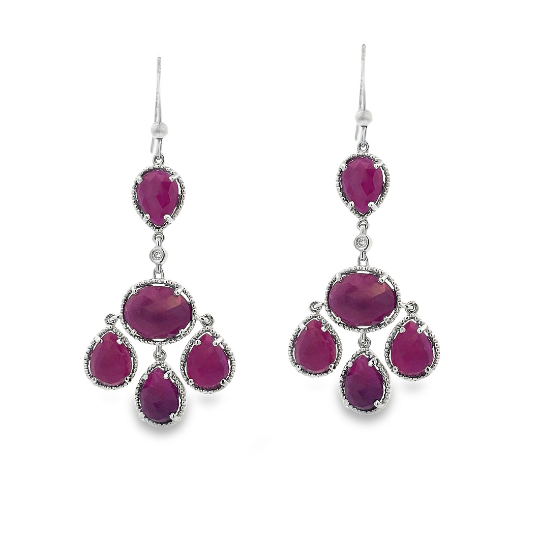 Sterling Silver drop earrings featuring red sapphires. Earrings mea...