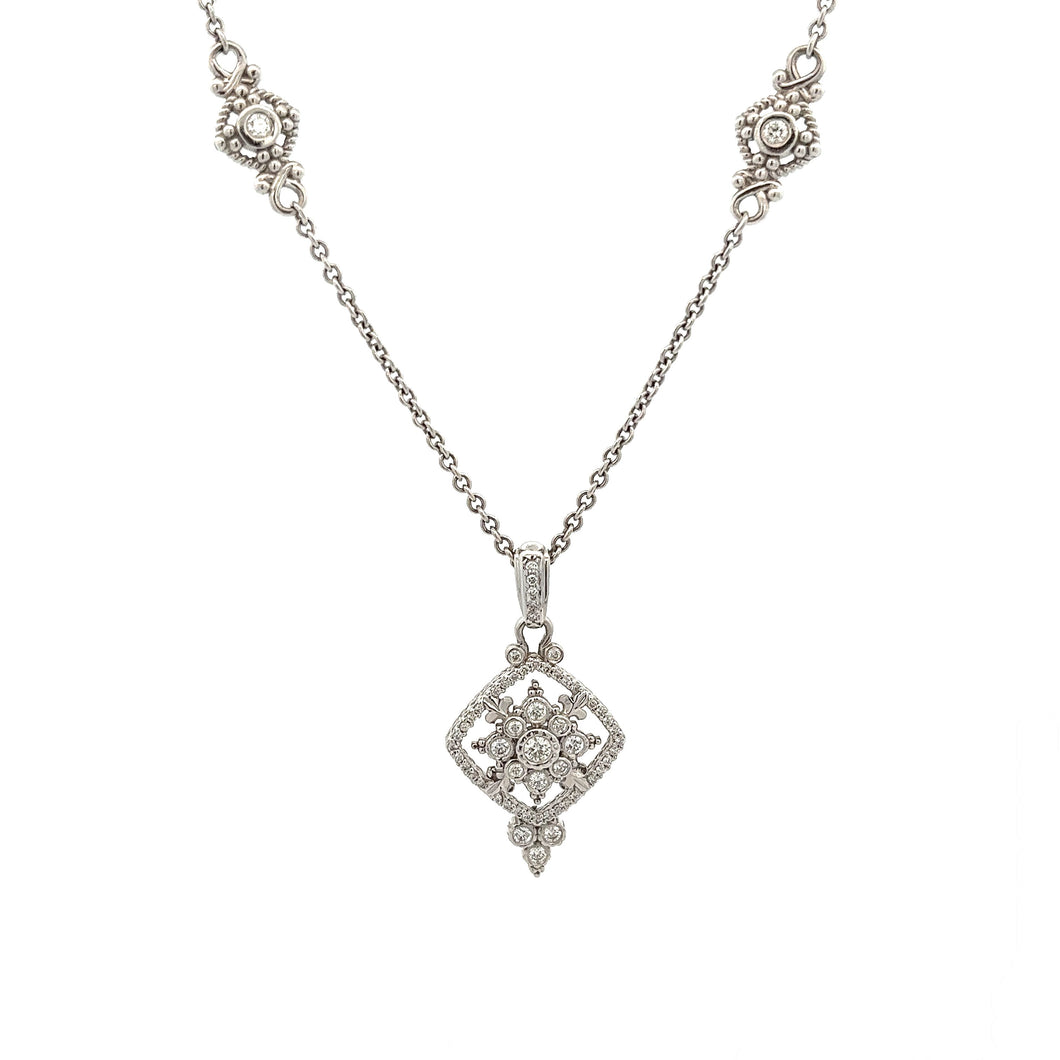 18k white gold necklace features bezel-set and pave-set diamonds to...