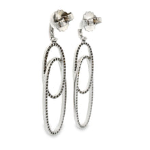 These gorgeous 18k white gold earrings feature round brilliant cut ...