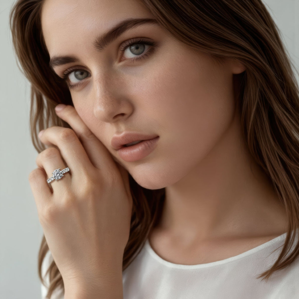 Model wearing an A.JAFFE round diamond engagement ring