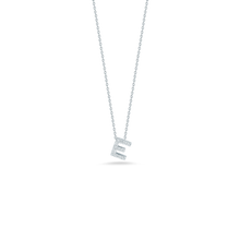 This necklace from Roberto Coin features a diamond initial on a 18