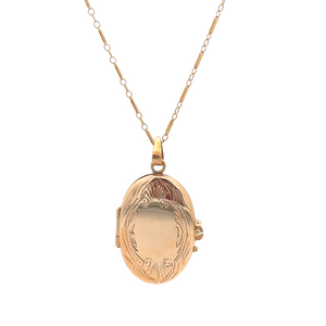 Estate piece: 14k yellow gold locket.
Necklace measures 16.5