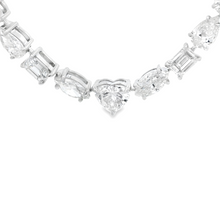 This beautiful 18k white gold necklace features 125 mixed shape dia...