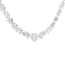 This beautiful 18k white gold necklace features 125 mixed shape dia...