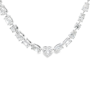 This beautiful 18k white gold necklace features 125 mixed shape dia...