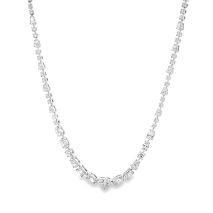 This beautiful 18k white gold necklace features 125 mixed shape dia...