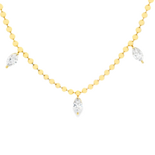 This beautiful 18k yellow gold necklace features 7 marquise cut dia...