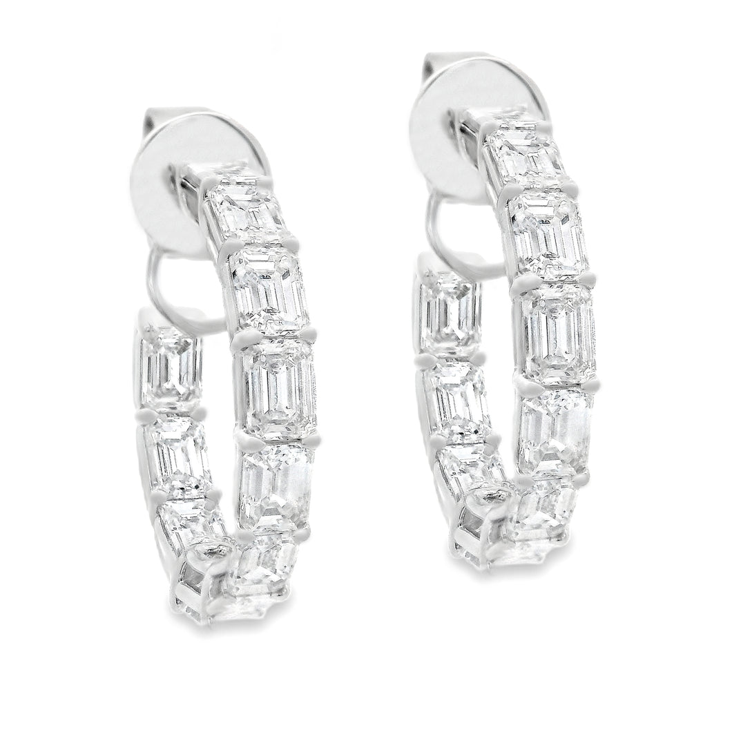These beautiful diamond hoops feature 22 emerald cut diamonds total...