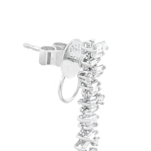 These beautiful 18k white gold diamond dangle earrings feature roun...