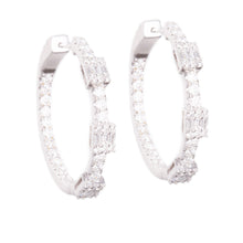 These beautiful diamond hoops feature round brilliant cut and bague...