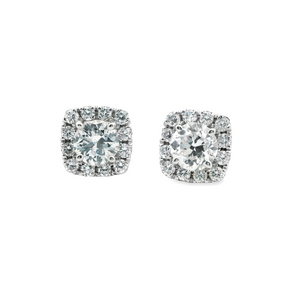 Estate piece: 14k white gold diamond stud earrings
Diamonds: 2 larg...