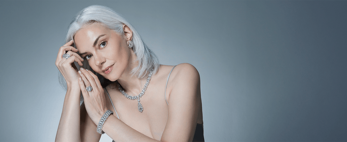 Model wearing Christopher Designs Crisscut diamond jewelry