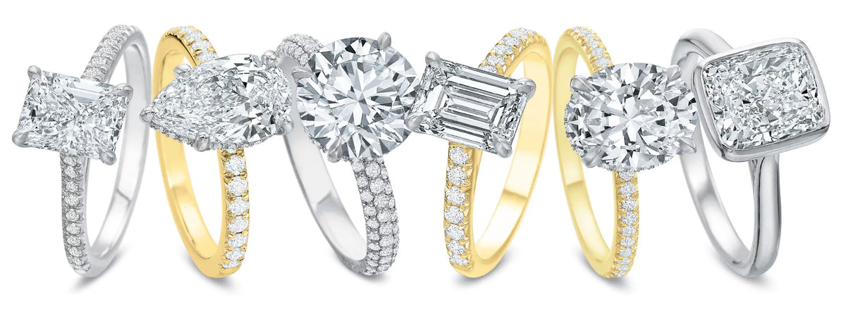 Six Precision Set diamond engagement rings in white and yellow gold