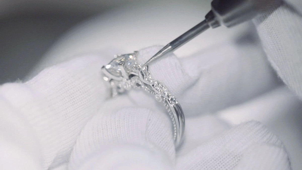 Verragio master jeweler setting a diamond in an engagement ring