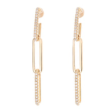 These 14k yellow gold diamond earrings feature diamonds totaling .1...