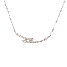 This modern and unique necklace features pave set diamonds totaling...