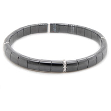 strecth coil bracelet featuring black ceramic, white gold and pave-...