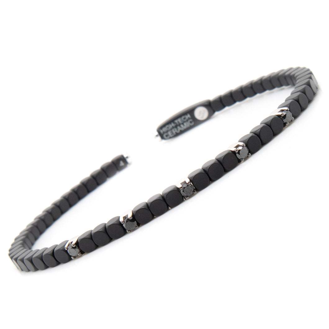This high tech matte black ceramic cuff bracelet features black dia...