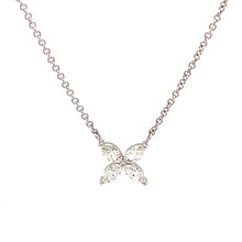 This 18k white gold necklace features 4 marquise cut diamonds arran...