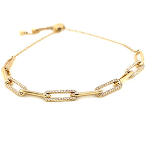 This modern link chain bracelet features pave set diamonds totaling...