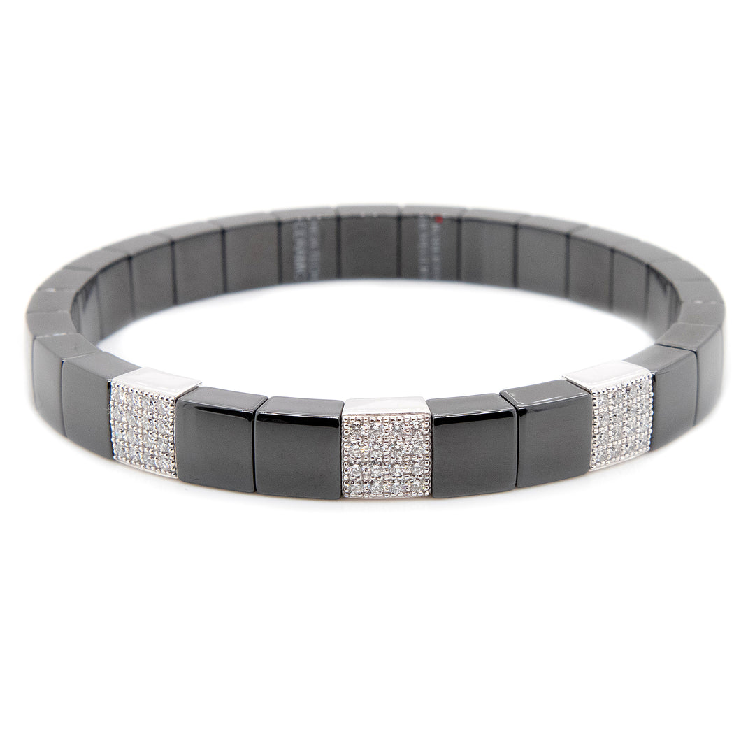 stretch bracelet on a double coil with black ceramic and diamonds o...