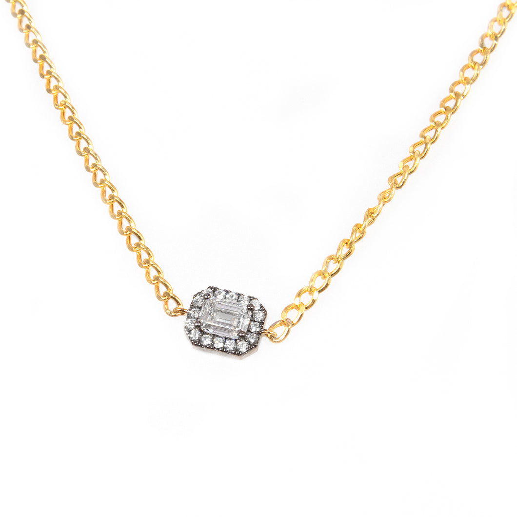 This necklace features an emerald cut diamond pendant that is GIA c...