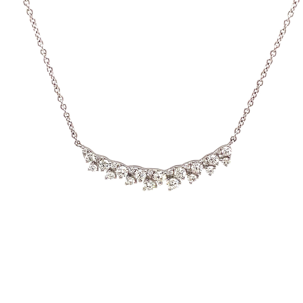 Features diamonds totaling .60ct on a 14k white gold chain