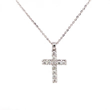 This beautiful cross pendant features 11 round brilliant cut diamon...