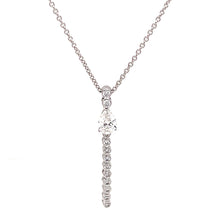 This necklace features a pear shape diamond and round brilliant cut...