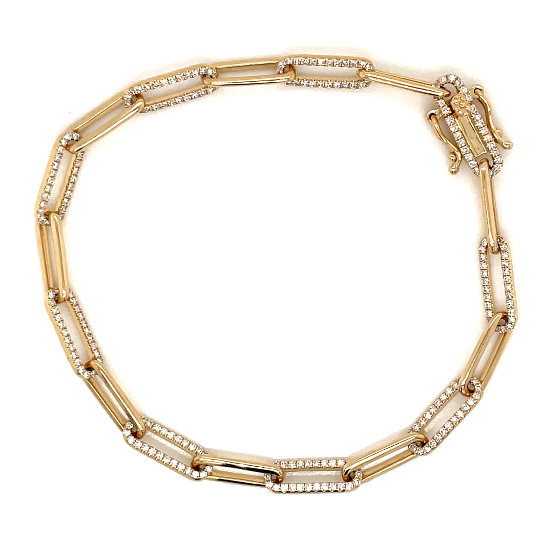 This chic 14k yellow gold bracelet features alternate pave set diam...