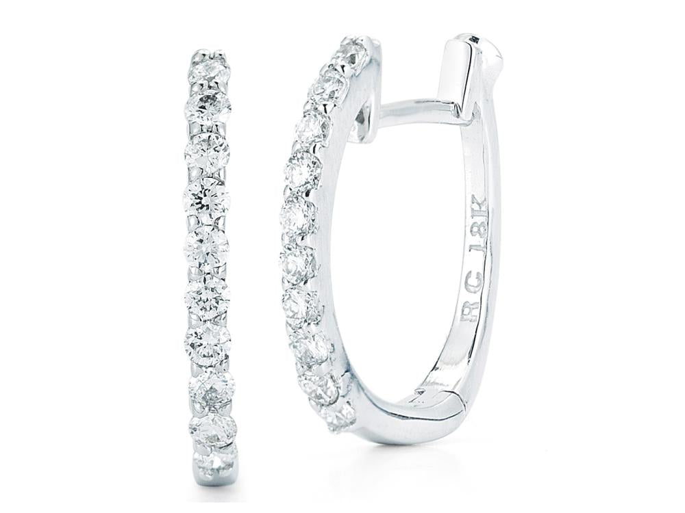These diamond huggy earrings from Roberto Coin features round brill...