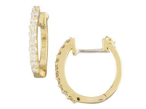 These diamond huggy earrings rom Roberto Coin feature round brillia...