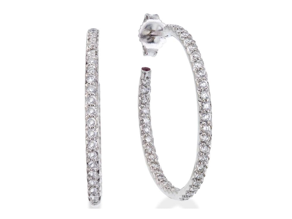 These diamond hoop earrings from Roberto Coin feature round brillia...