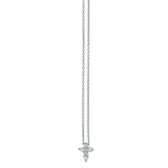 This diamond cross features round brilliant cut diamonds that total...