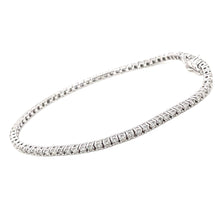 Tennis bracelet features 18 white gold and diamonds totaling 1.06ct