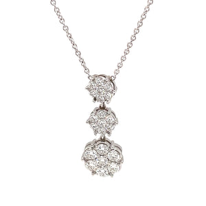 This triple drop necklace features round brilliant cut diamonds tot...