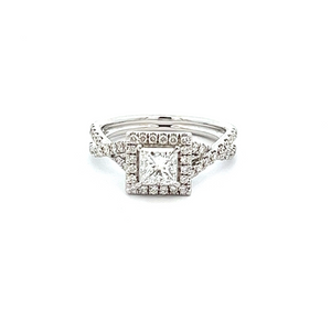 This unique ring features a .70ct princess cut diamond on a 14k whi...