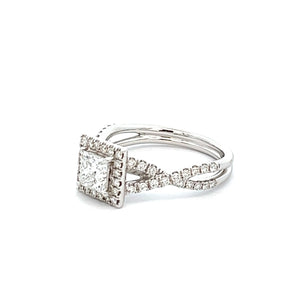 This unique ring features a .70ct princess cut diamond on a 14k whi...