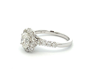 This vintage inspired engagement ring features a .80ct oval cut dia...