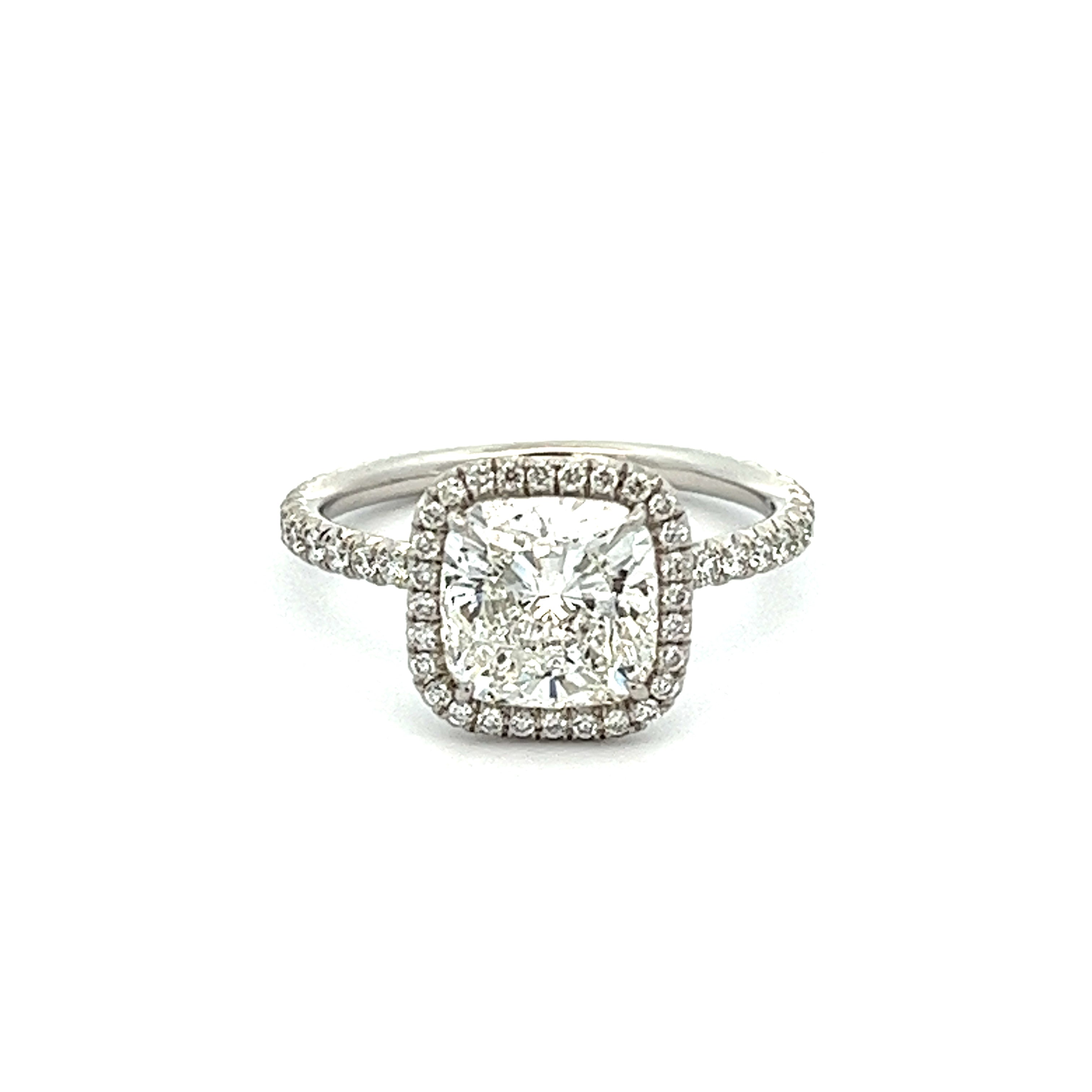 Cushion cut halo diamond engagement ring in platinum Clearance