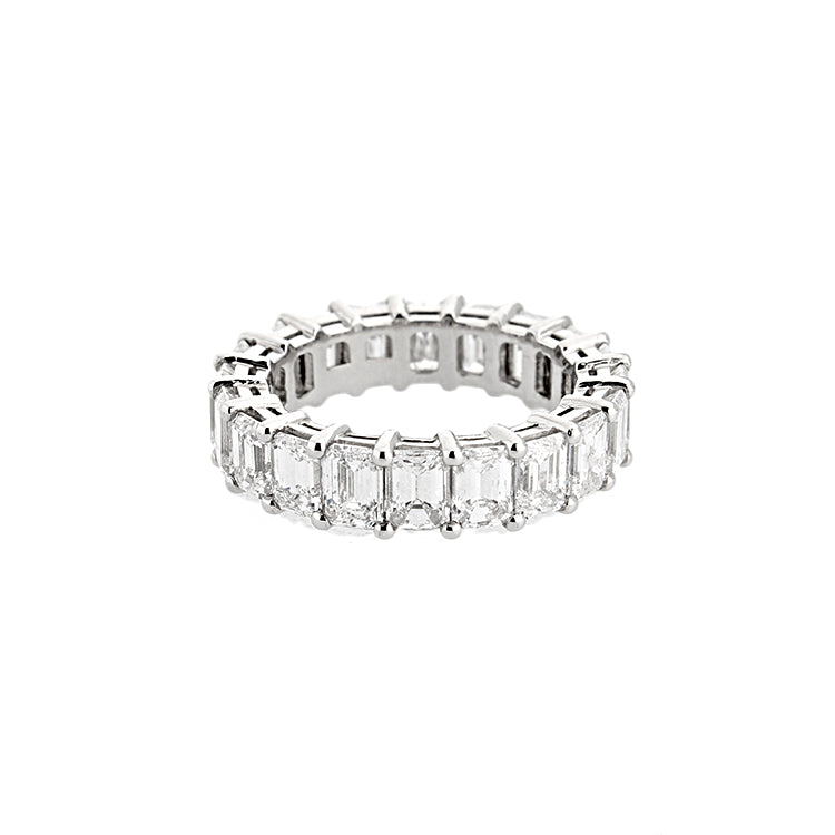 This diamond eternity band features emerald cut diamonds that total...