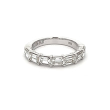 This gorgeous 18k white gold ring features 7 baguette cut diamonds ...