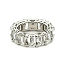 


 
Stunning emerald cut diamonds are set in shared prongs that ru...