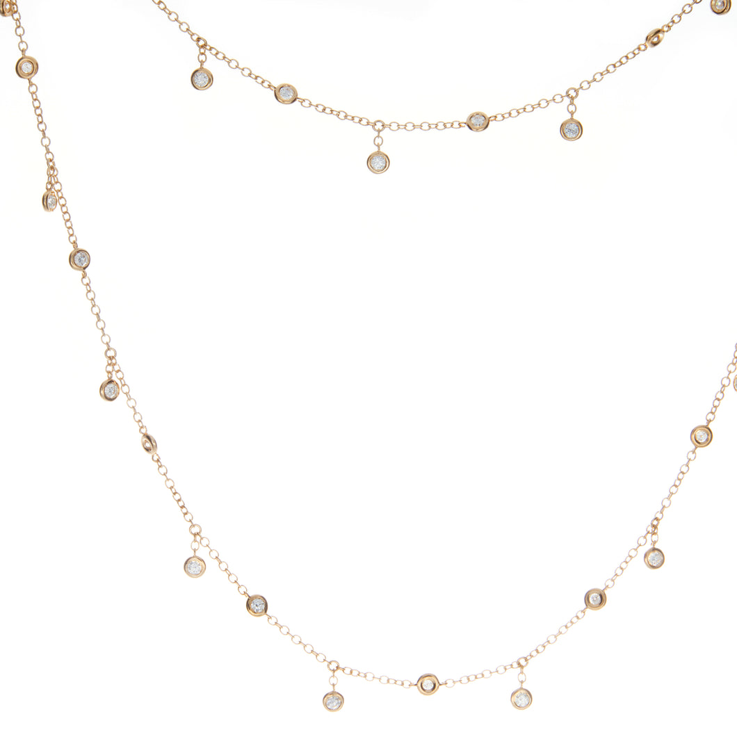 this longer necklace features bezel set diamonds totaling 2.37ct. n...